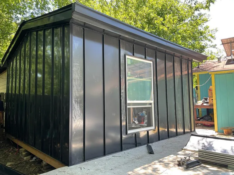 Black standing seam metal wall panels for Roof Inspection in Ridgefield